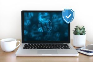 laptop with wordpress graphic